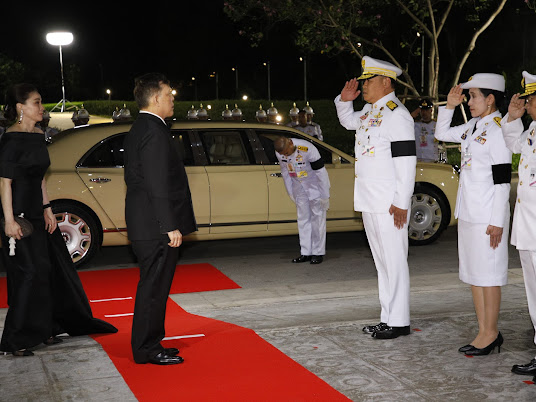 Their Majesties arriving at Mahidol Siddhachada Hall