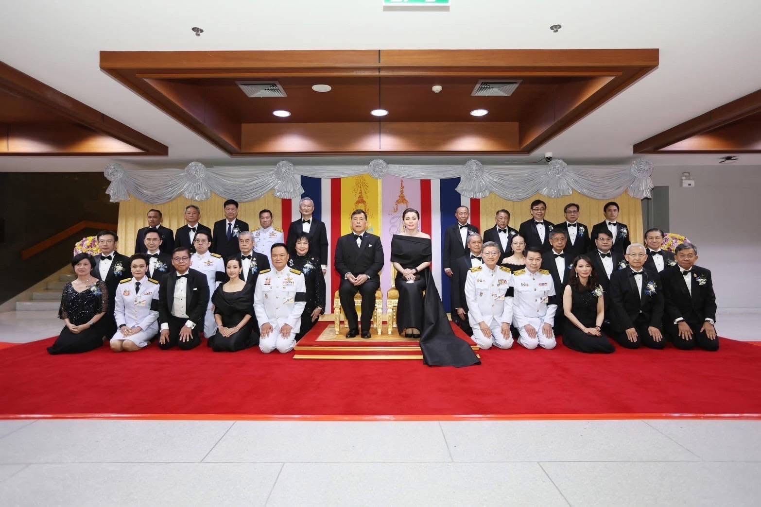 Group portrait with Their Majesties